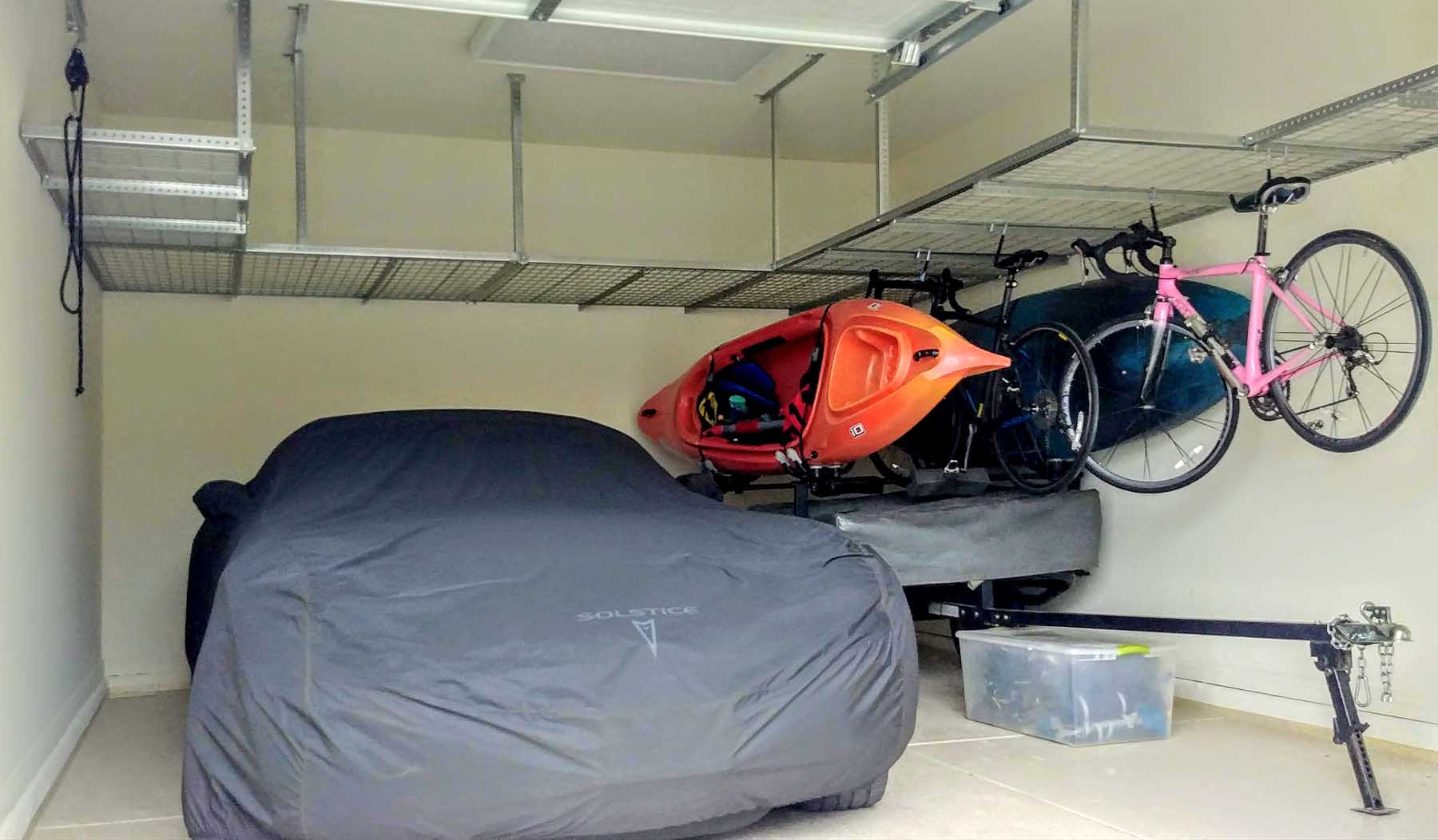Park your car in the garage again after we install our overhead garage storage racks