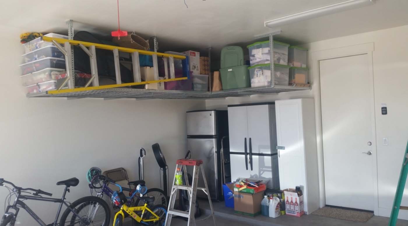Ladder hangers and overhead garage shelves
